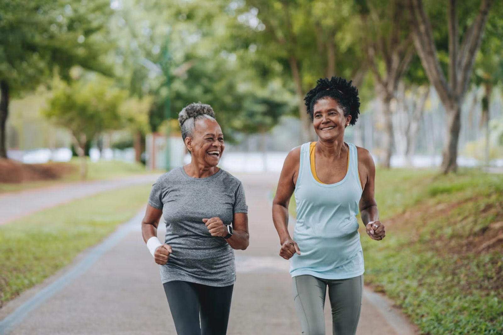 Two women walking together outdoors